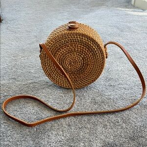 Cute round rattan purse.